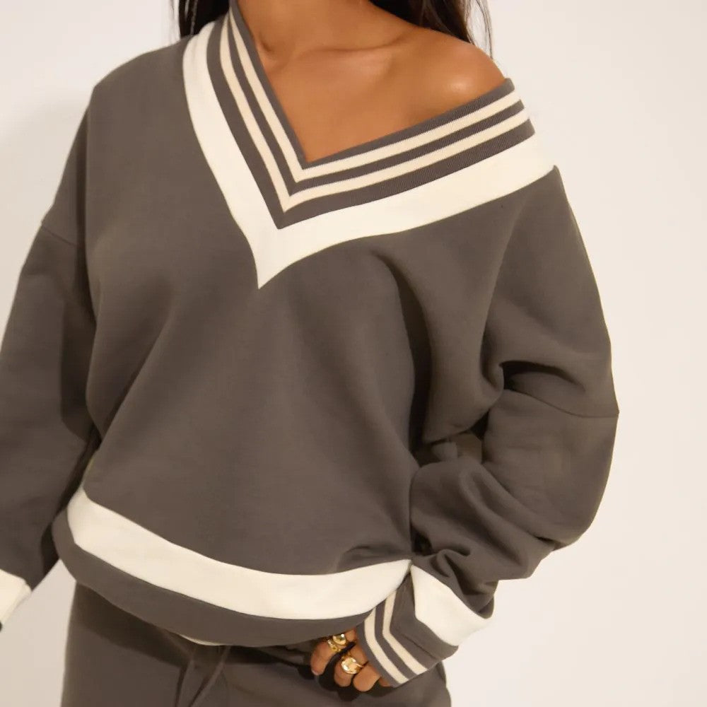 Stay effortlessly stylish in our Grey Contrast Stripe V-Neck