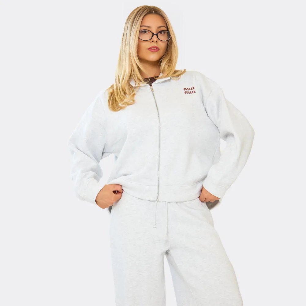 Light Grey Stay stylish and comfy in our ‘Min Min’ zip-up sweatshirt and wide-leg joggers