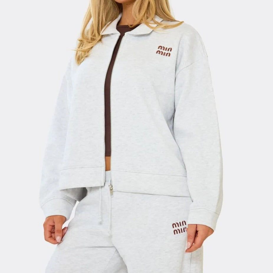 Light Grey Stay stylish and comfy in our ‘Min Min’ zip-up sweatshirt and wide-leg joggers
