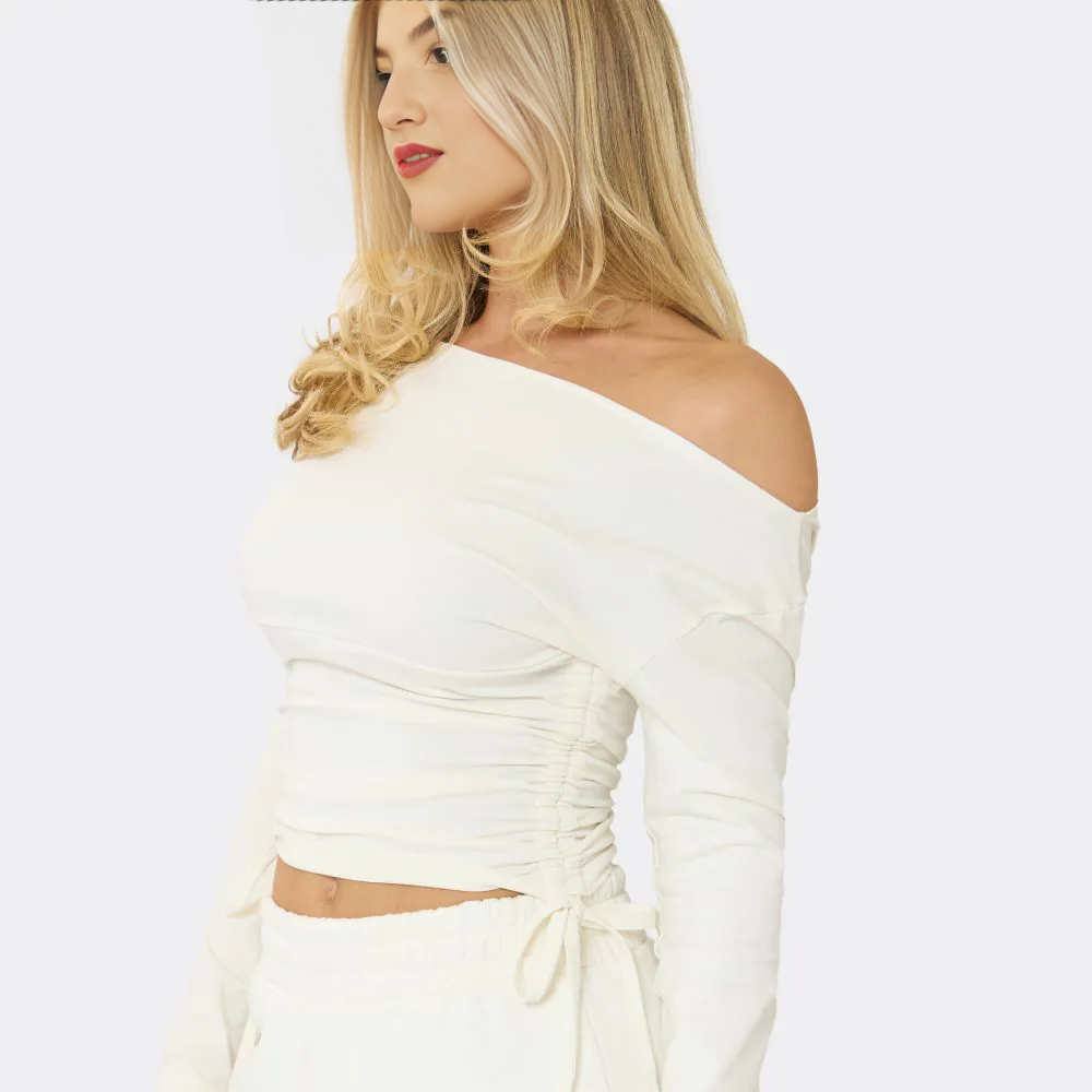 Long Sleeve Asymmetric Cinched Waist Ruched Detail Top In Cream