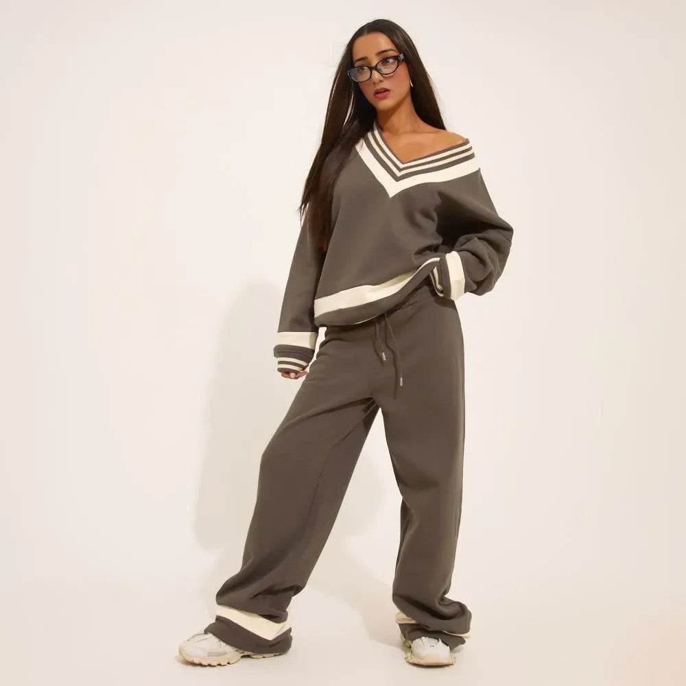 Stay effortlessly stylish in our Grey Contrast Stripe V-Neck